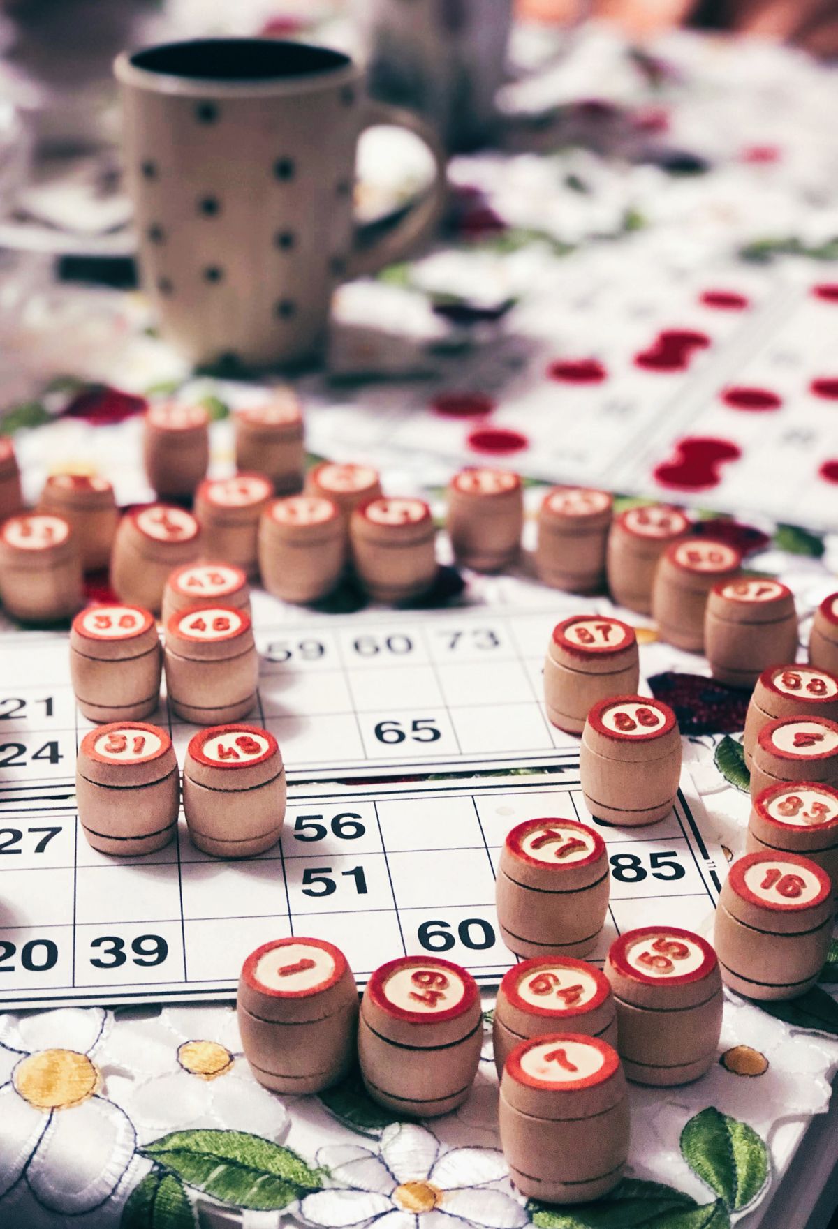 Bingo cards and chips on a table